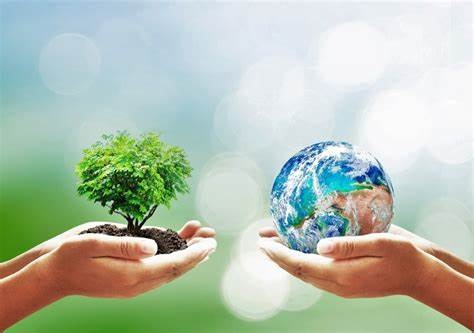 Two Hands Holding a Plant and a Globe